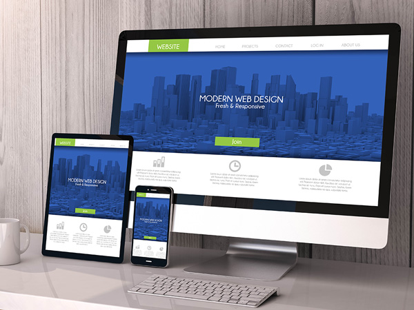 Monitor, tablet and phone showing responsibe web site